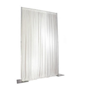 white pleated curtains backdrop